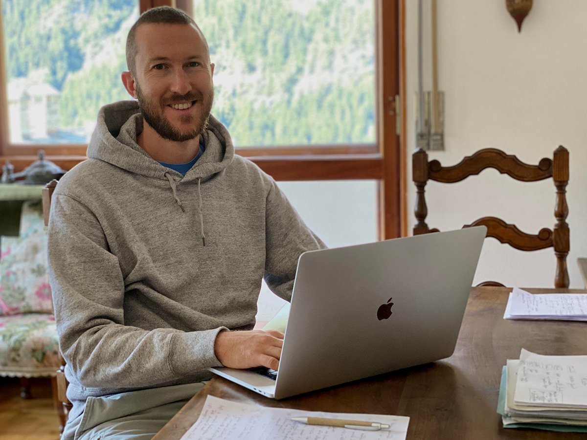 Andrea Bosoni, founder of Zero to Marketing, at his laptop. 