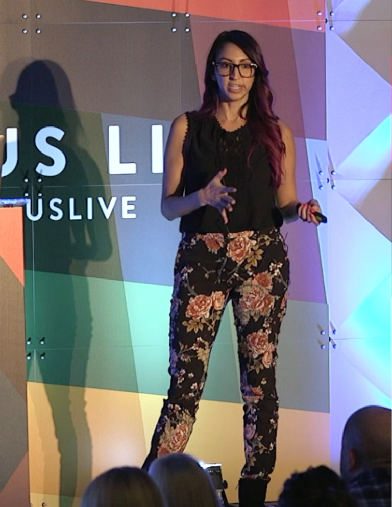 Picture of Crystal Ledesma giving a talk at Litmus Live in 2018